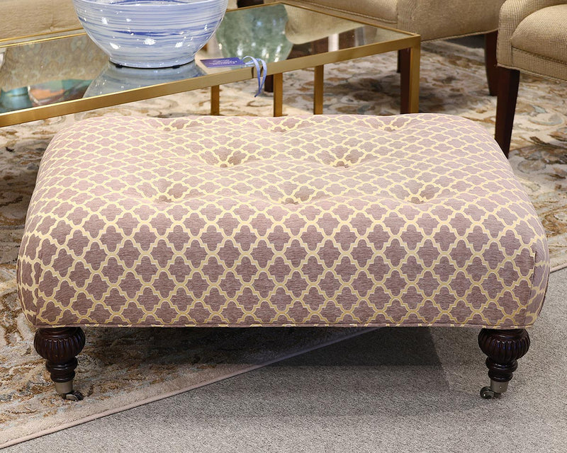 Plum and Gold Frettework Ottoman on Turned Legs with Casters