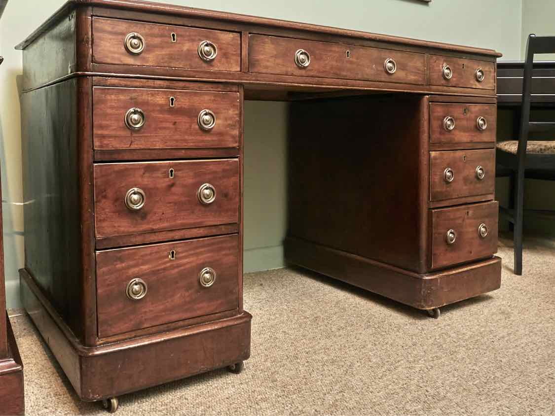 Antique Cherry Leather Top 9 Drawer Desk On Casters