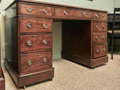 Antique Cherry Leather Top 9 Drawer Desk On Casters
