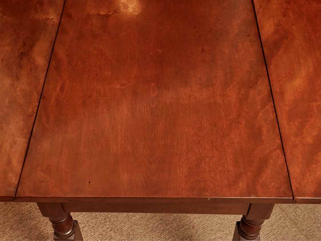 Antique Cherry Drop Leaf With Turned Legs On Casters Dining Table