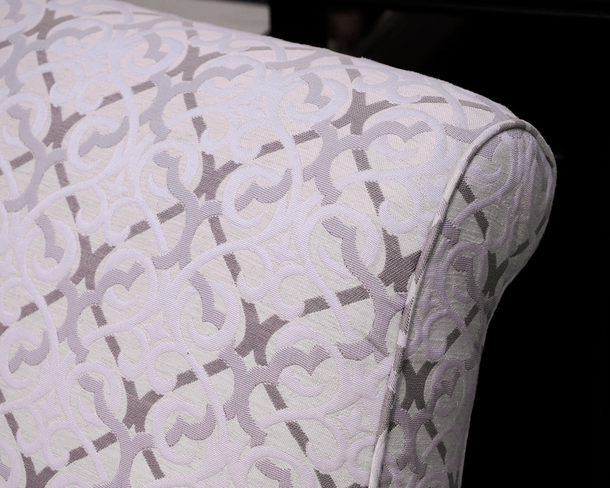 Upholstered Settee with Rolled Arms and Turned Legs