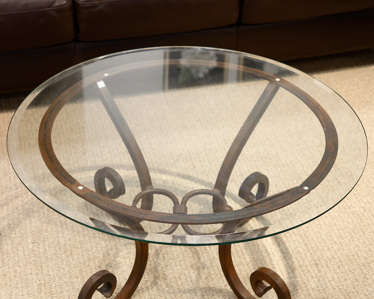 Comina Round Glass and Iron Scroll Base Cocktail Table