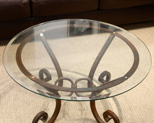 Comina Round Glass and Iron Scroll Base Cocktail Table