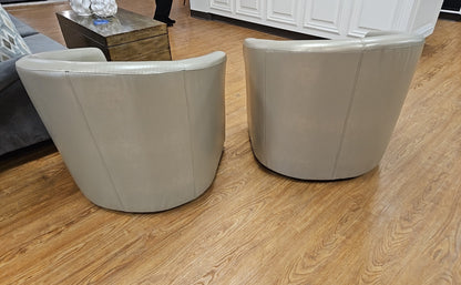 Pair Of Champagne Swivel Chairs