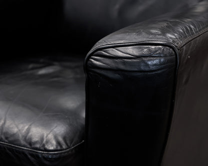Natuzzi Black Leather Chair and Ottoman