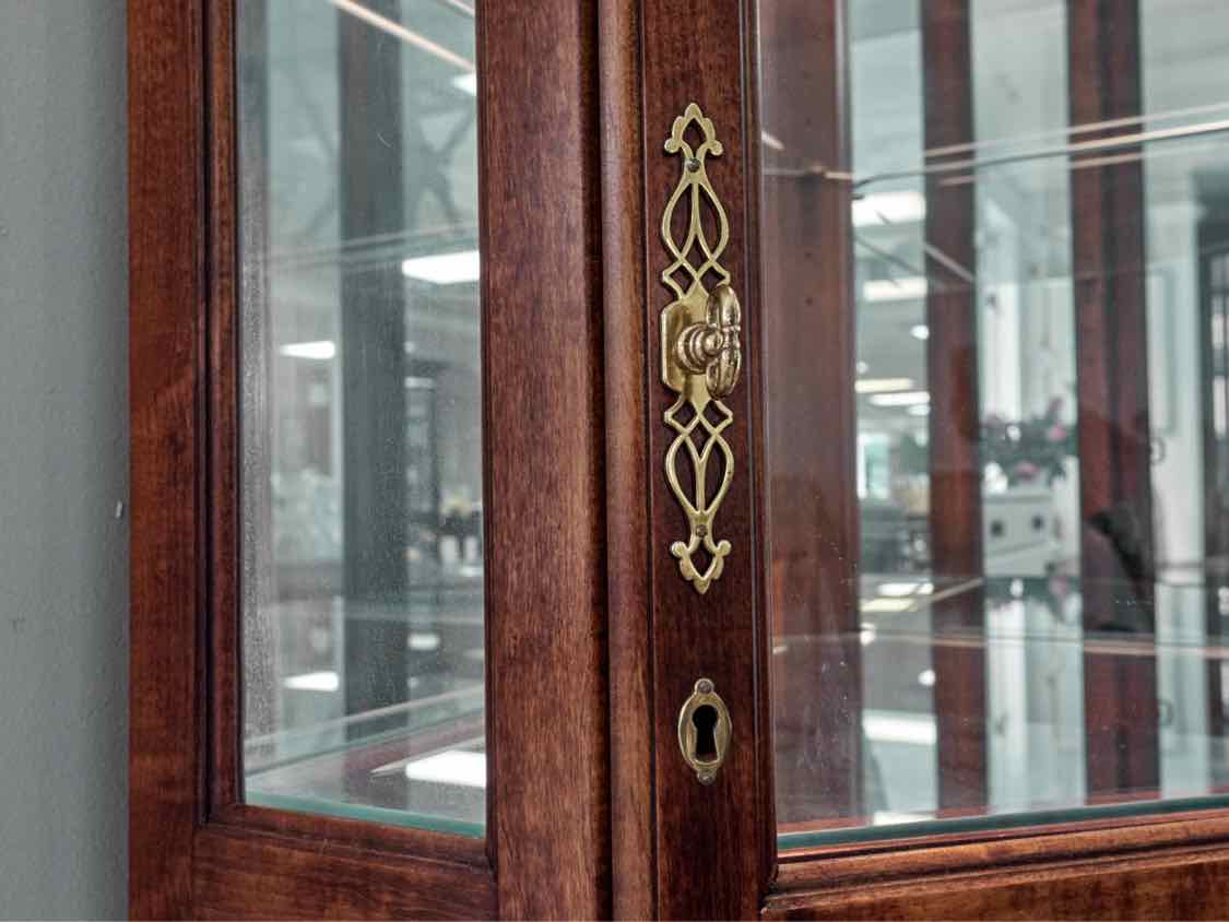 Howard Miller Lighted Cherry Corner Display Cabinet