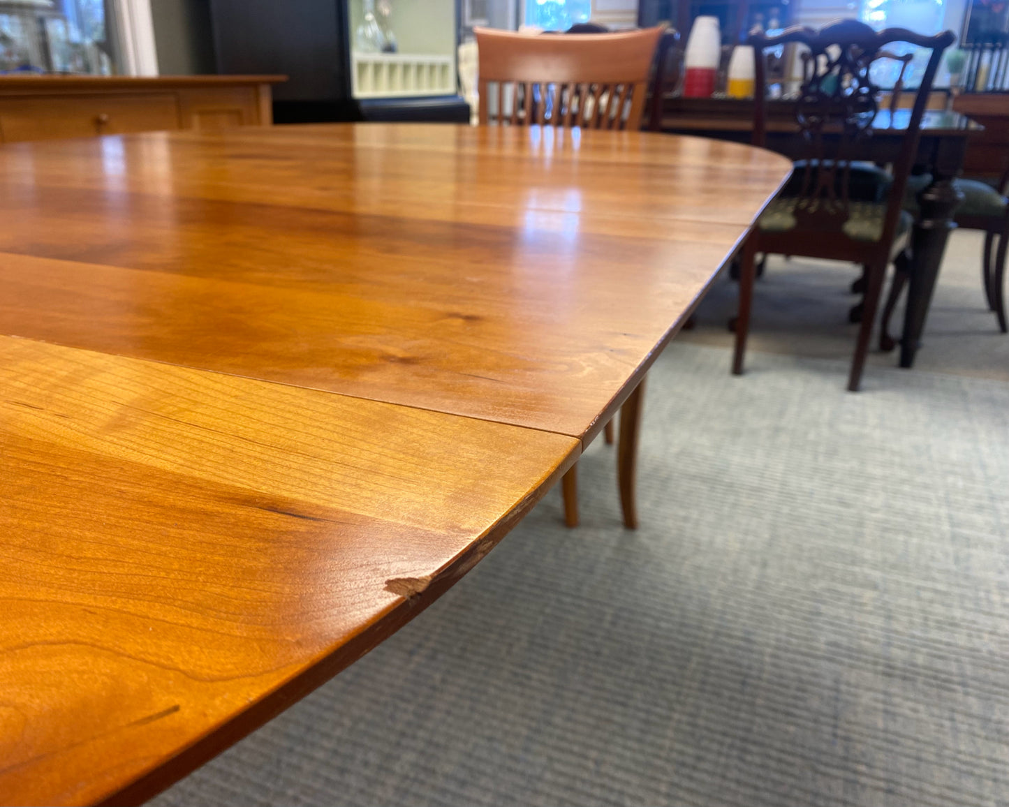 A. Sibau Round Dining Table with Leaves & Set of 6 Spindle-back Chairs in Cherry