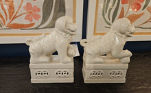 Pair of White Porcelain Foo Dogs