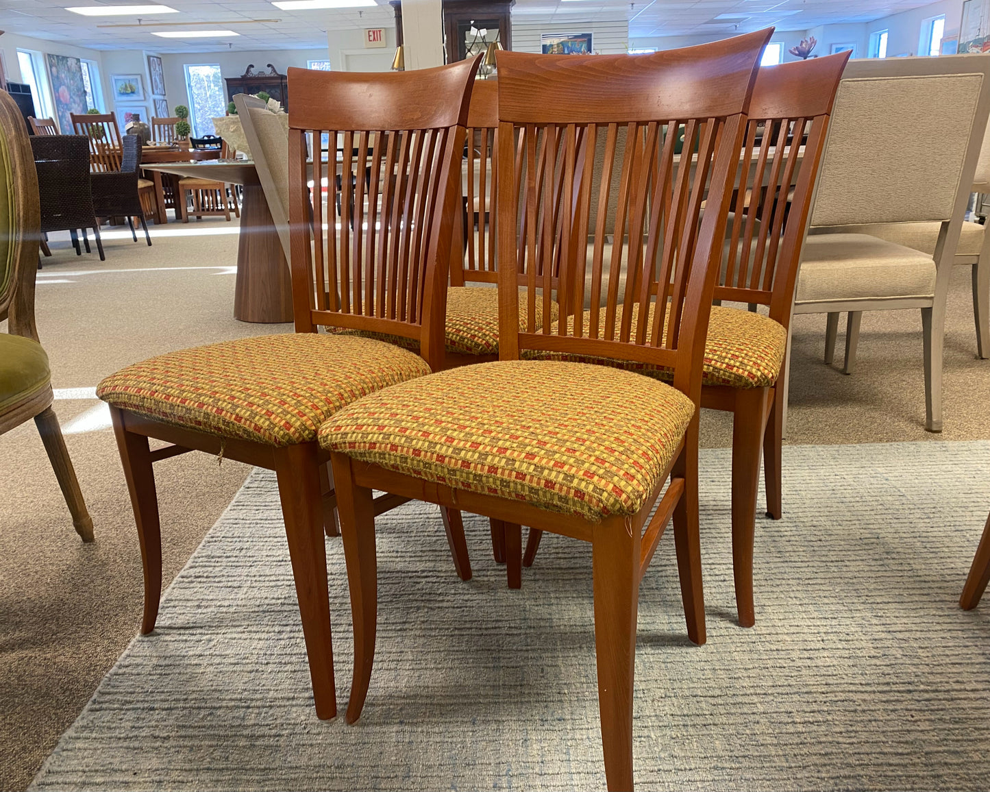 A. Sibau Round Dining Table with Leaves & Set of 6 Spindle-back Chairs in Cherry