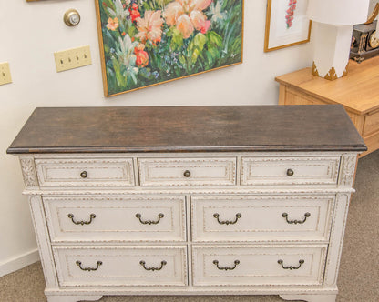 Eridani 7 Drawer Dresser in Distressed Parchment