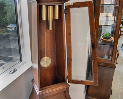 Howard Miller Grandfather Clock In American Cherry