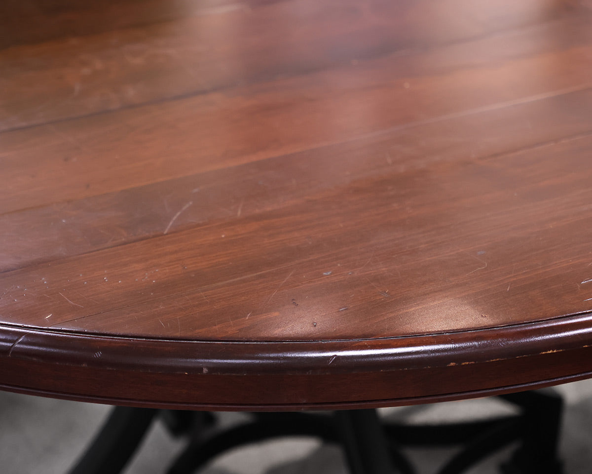 Round Mahogany Table With Metal Base and Six Chairs