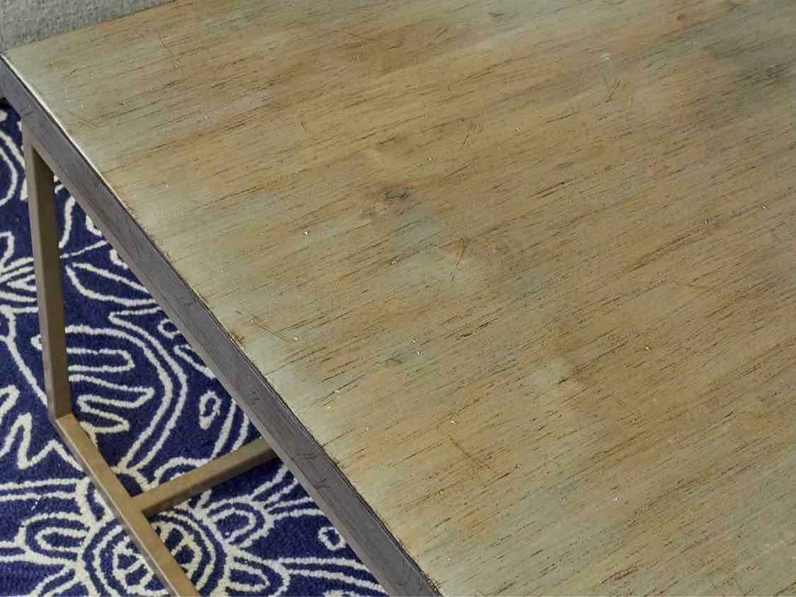 Lorts Driftwood Finish Top Cocktail Table with Taupe Metal Base