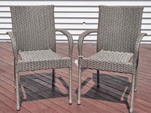 Pair Of Nautica Outdoor  Resin Weave Arm Dining Chairs