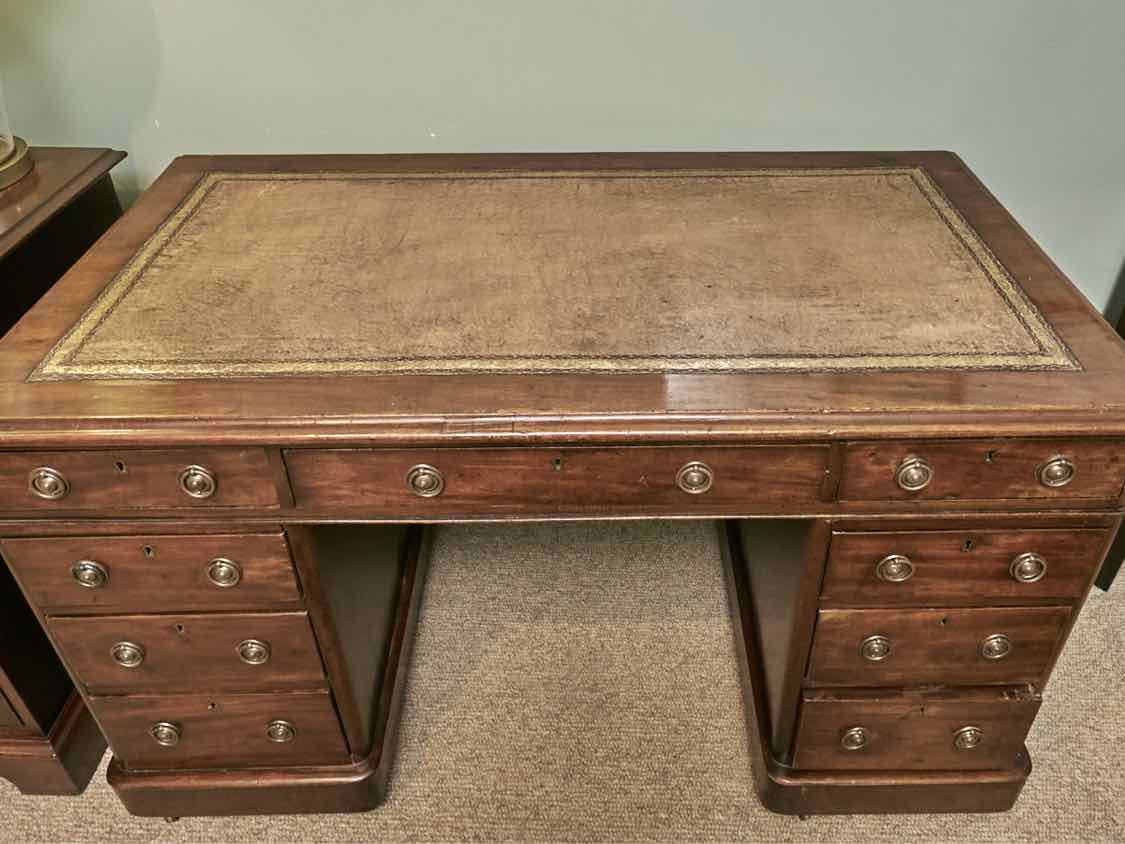Antique Cherry Leather Top 9 Drawer Desk On Casters