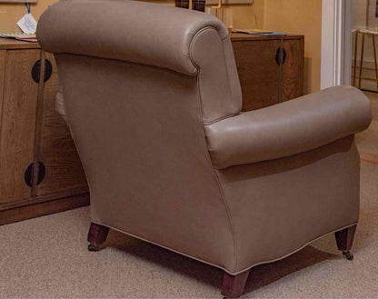 Pair Of Brunschwig & Fils Taupe Leather Club Chairs On Casters