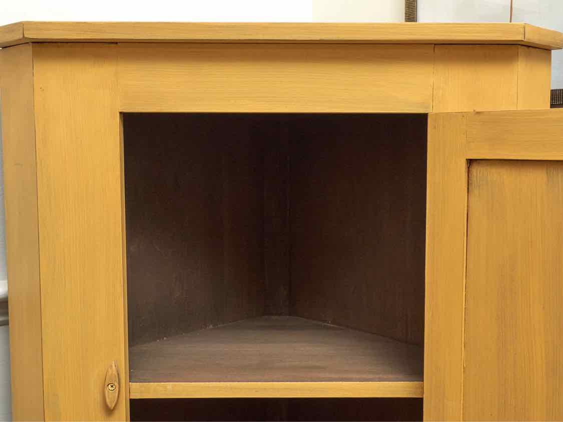 Corner Cabinet with Raised Panel Door in Butter Yellow Finish