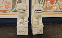 Pair of White Porcelain Foo Dogs