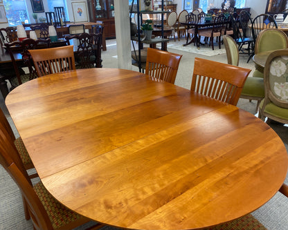 A. Sibau Round Dining Table with Leaves & Set of 6 Spindle-back Chairs in Cherry