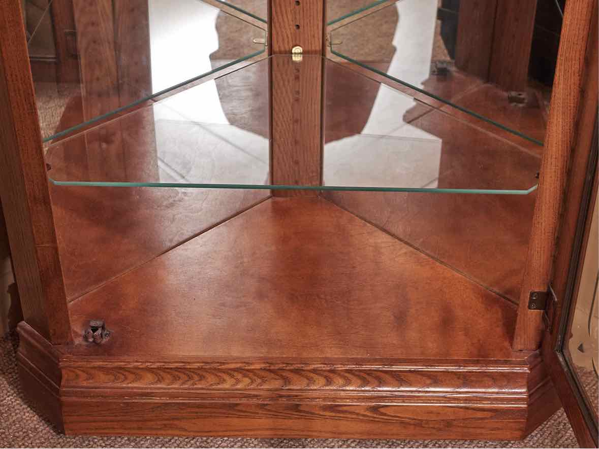 Howard Miller Oak Corner Display Curio Cabinet
