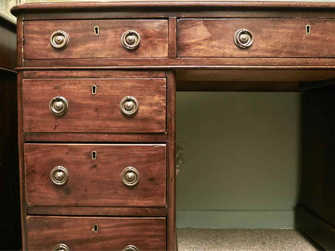 Antique Cherry Leather Top 9 Drawer Desk On Casters