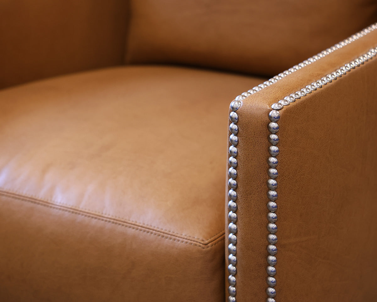 Ironies Tule Lounge Chair in Saddle Leather with Silver Nailhead Trim