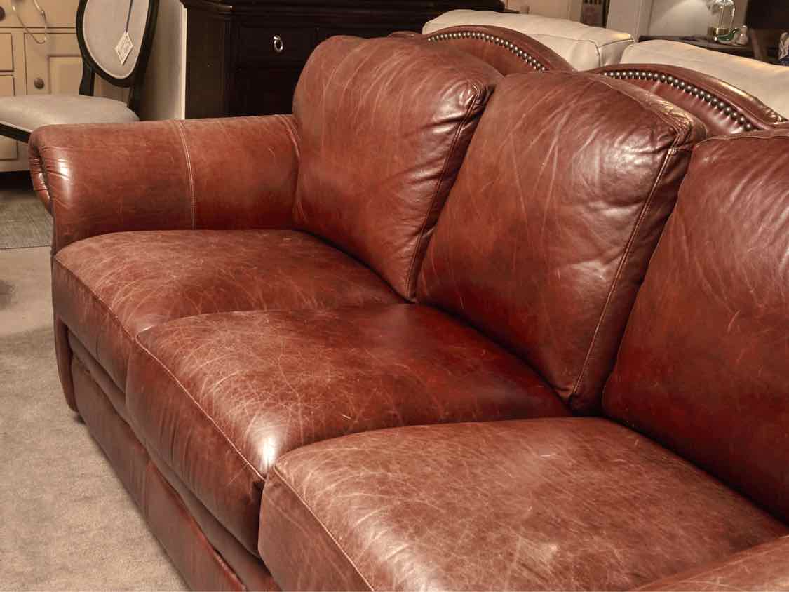 Robinson & Robinson Inc  Amber Cognac Leather 3 Cushion Nailhead Trim Sofa