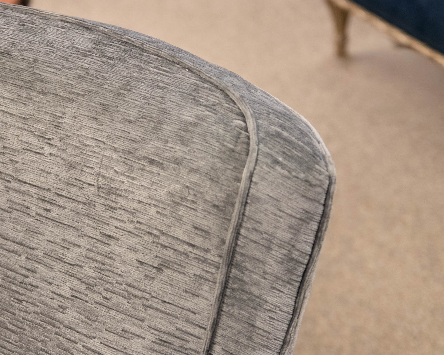 Basset Swivel Chair Upholstered In Grey Chenille Fabric