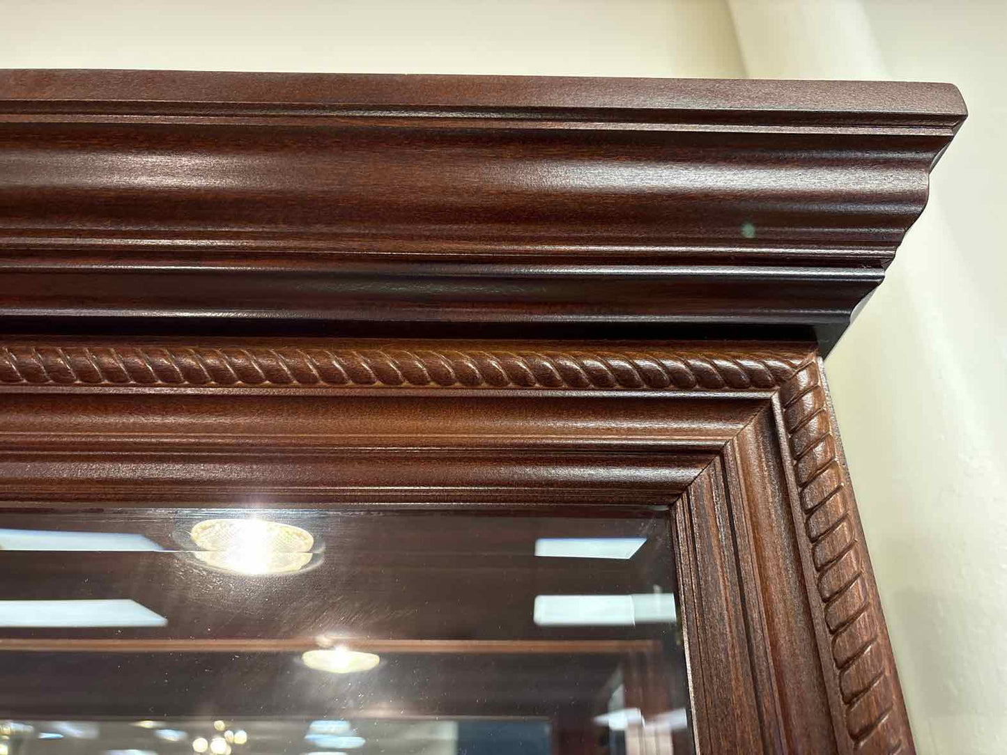 Pulaski Lighted Side Entry Curio Cabinet in Cherry