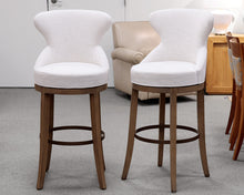 Pair of Serena & Lily "Grace" Swivel Bar Stools