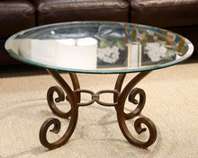 Comina Round Glass and Iron Scroll Base Cocktail Table
