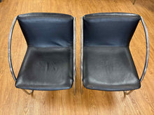 Pair of Black Leather and Steel Lens Chairs