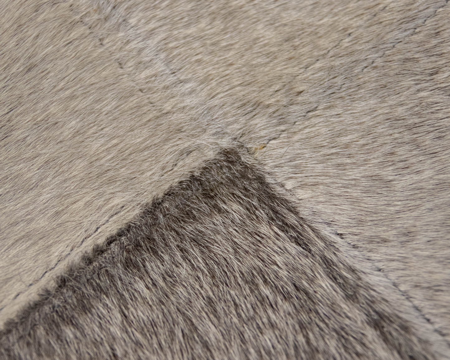 Global Views Hair-on-Hide Cocktail Ottoman in Grey