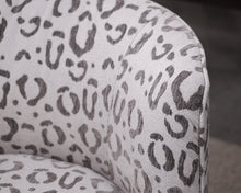 Pair of MCM Animal Print Upholstered Swivel Chairs