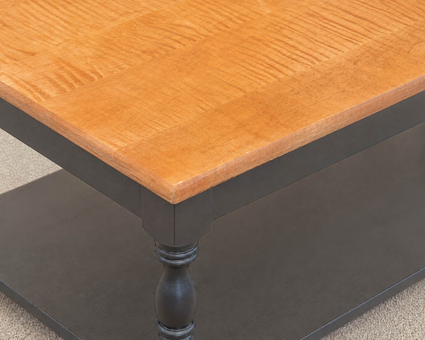 Tiger Maple Top Cocktail Table with Black Finish Spool Leg Base
