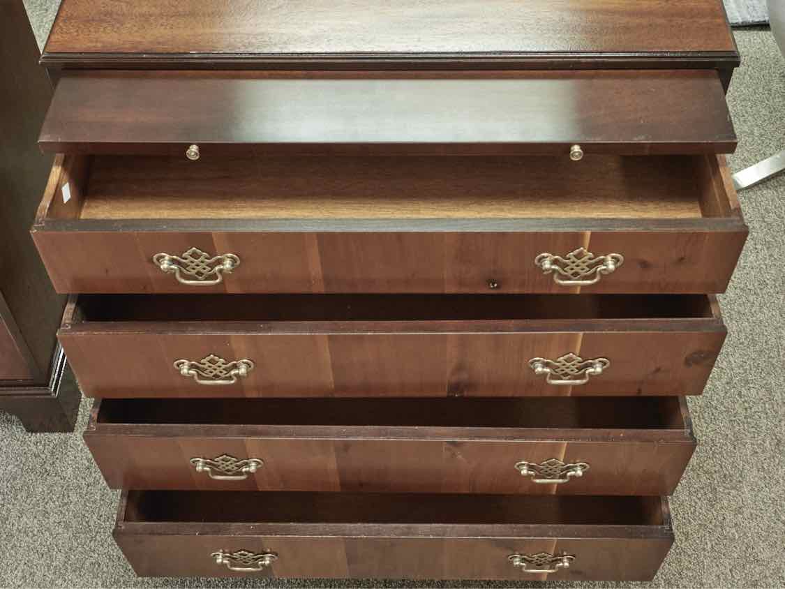 Pair of Two Tone Mahogany Four Draw Chippendale Chests