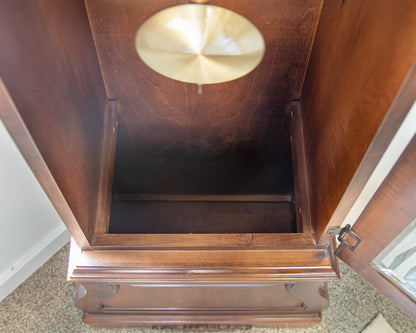 Howard Miller Grandfather Clock In American Cherry
