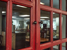 Crate & Barrel Glass Door Display Cabinet in Rustic Red