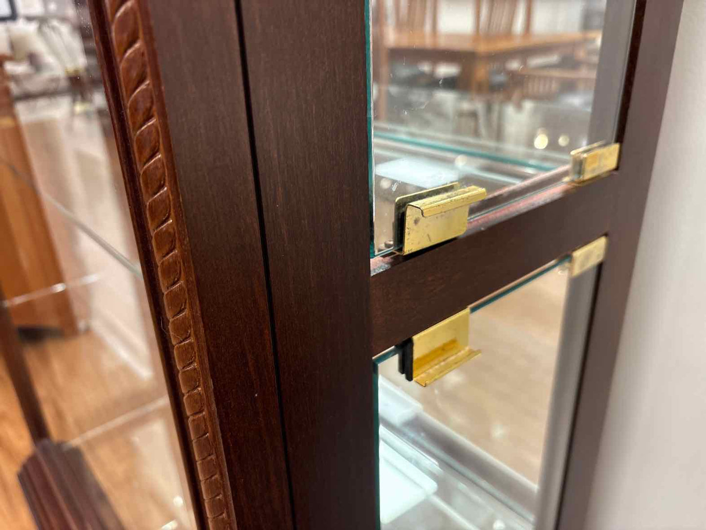 Pulaski Lighted Side Entry Curio Cabinet in Cherry