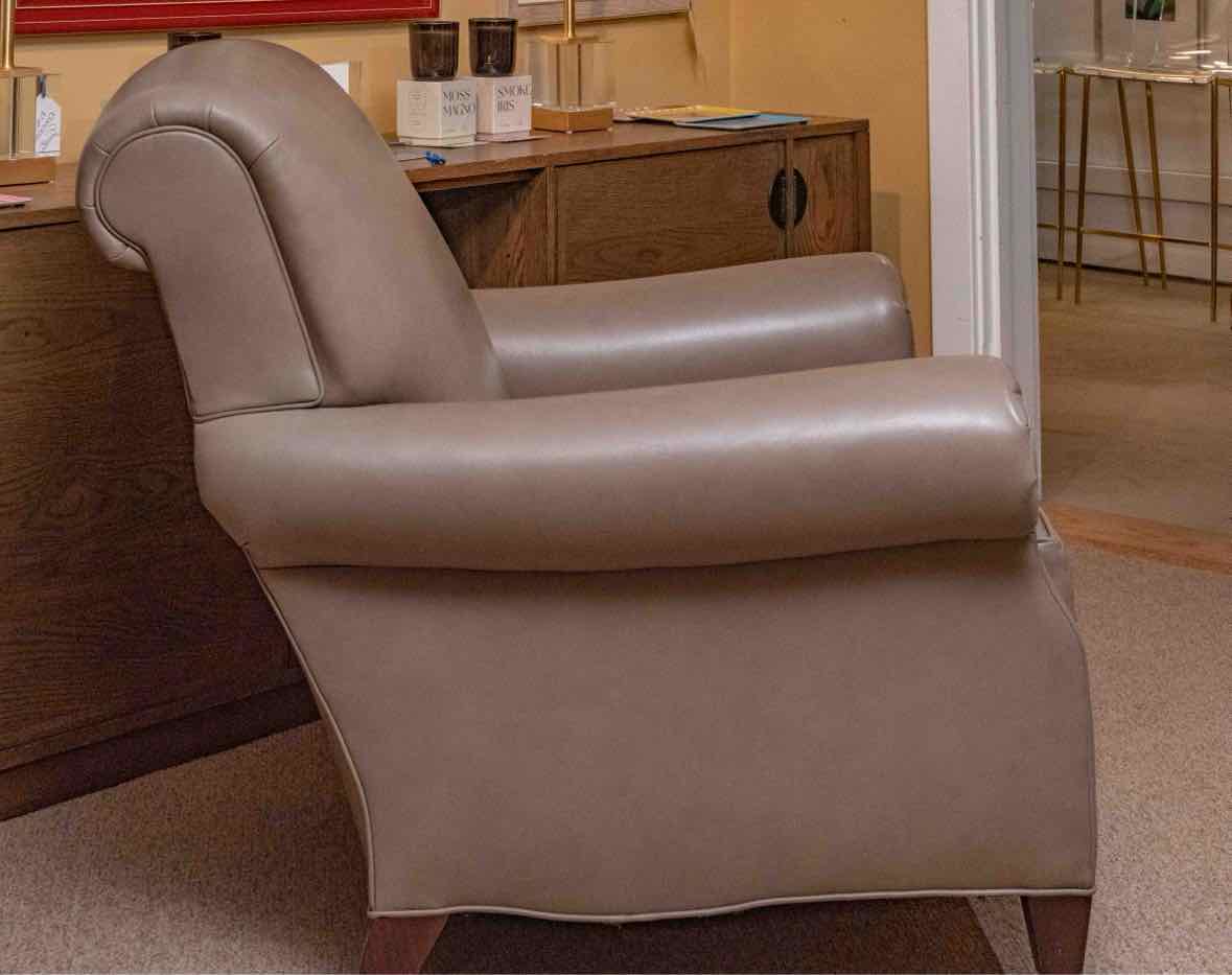 Pair Of Brunschwig & Fils Taupe Leather Club Chairs On Casters