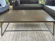 Lorts Driftwood Finish Top Cocktail Table with Taupe Metal Base