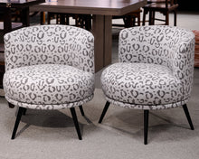 Pair of MCM Animal Print Upholstered Swivel Chairs