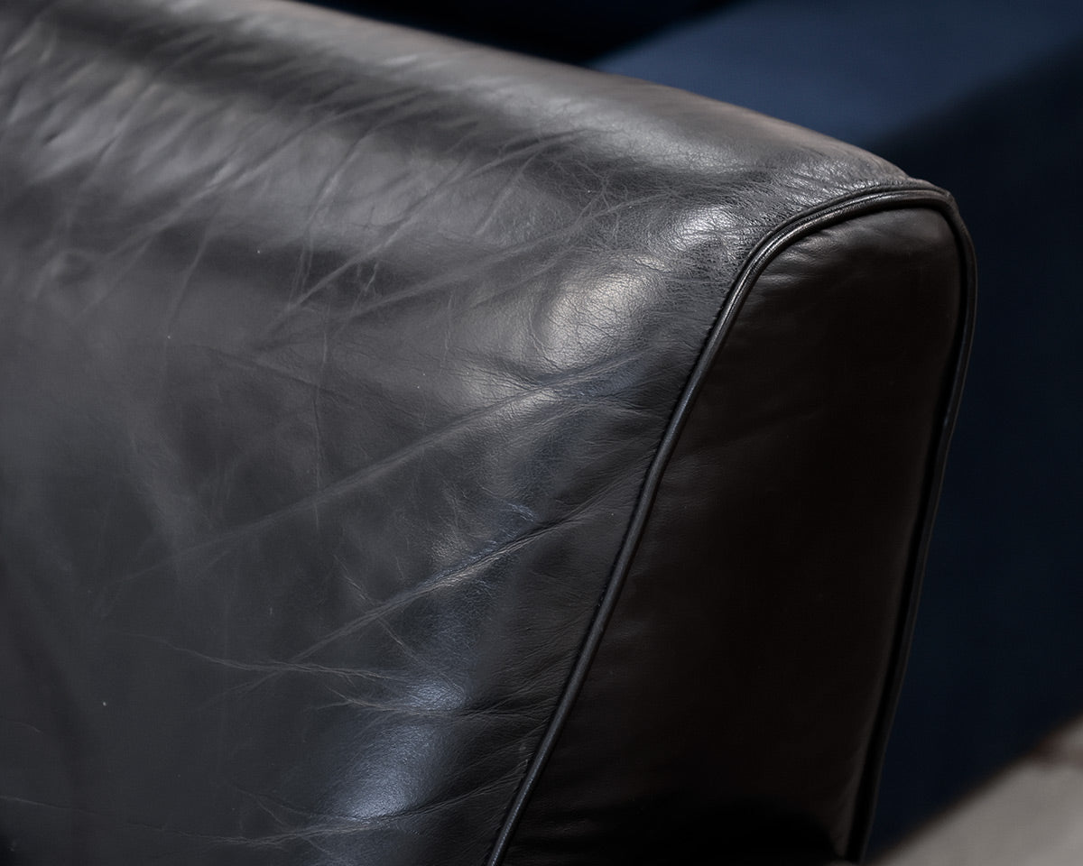 Natuzzi Black Leather Chair and Ottoman