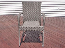 Pair Of Nautica Outdoor  Resin Weave Arm Dining Chairs