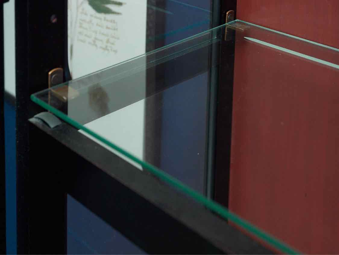 Howard Miller Black Lighted Two Door Display Cabinet with Red Rub Through