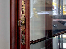 Howard Miller Cherry & Glass Curio Cabinet