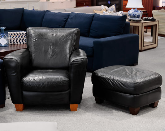 Natuzzi Black Leather Chair and Ottoman