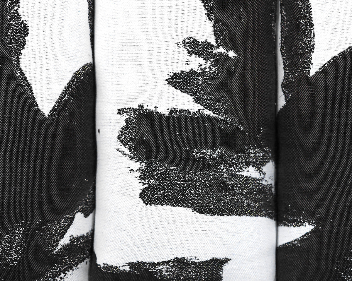 Contemporary Channel-Tufted Ottoman in Black & White