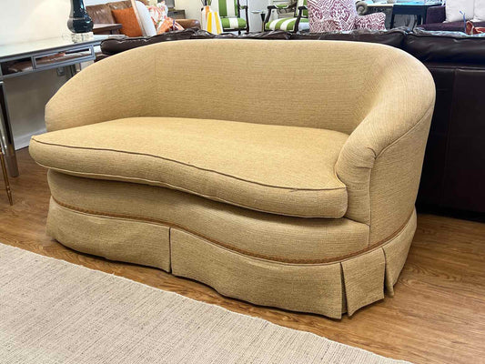 Kidney Shaped Skirted Loveseat In Textured Wheat Upholstery