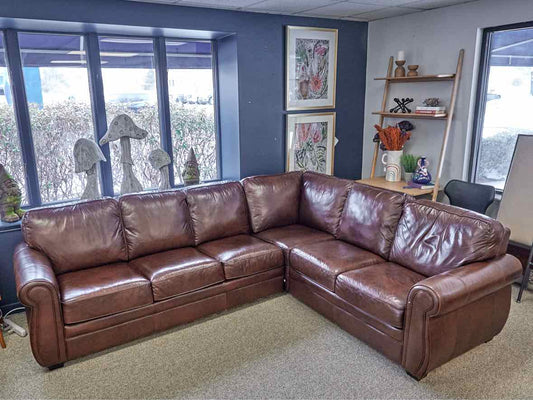 Jordan's 2-Pc Roll Arm Sectional in Capri Chestnut Bonded Leather